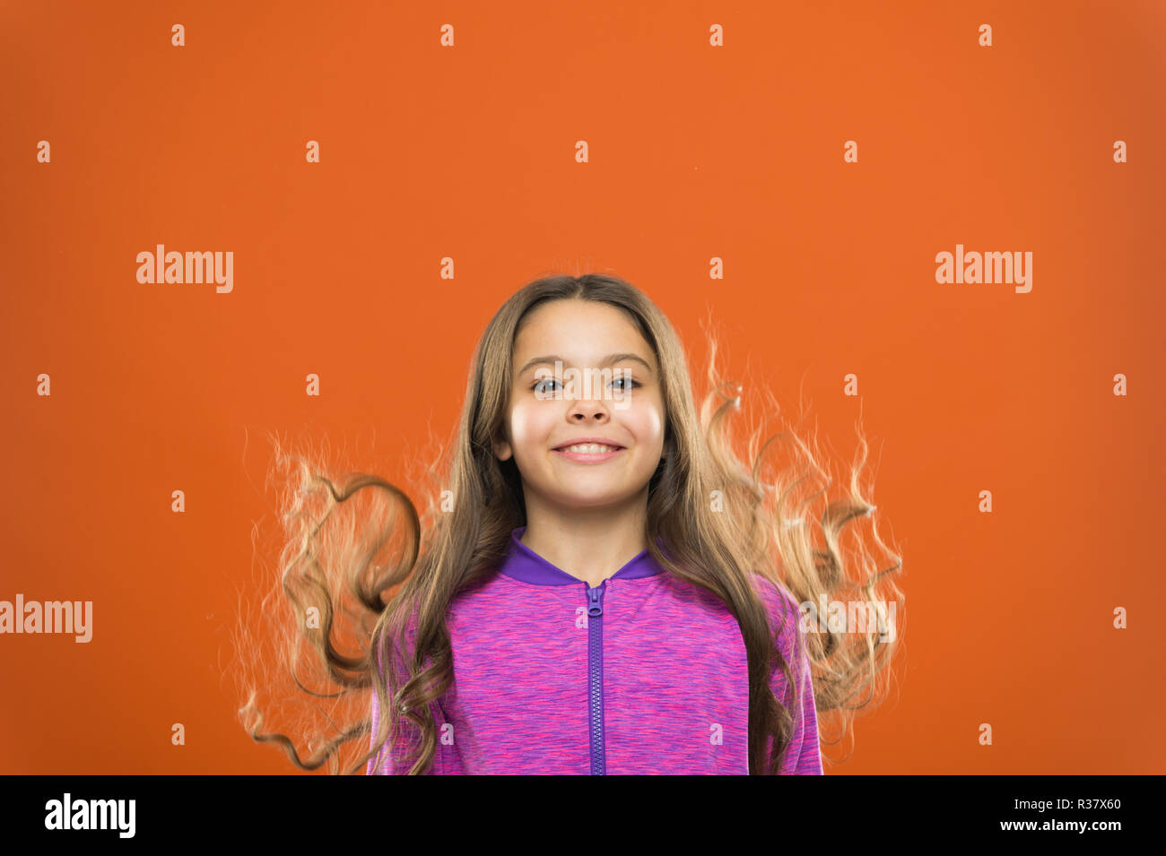 Little girl grow long hair. Teaching child healthy hair care habits. Strong hair concept. Melanin substance give pigment. Person with brown has much more melanin. Kid girl long healthy shiny hair Stock Little girl grow long hair. Teaching child healthy hair care habits. Strong hair concept. Melanin substance give pigment. Person with brown has much more melanin. Kid girl long healthy shiny hair Stock
