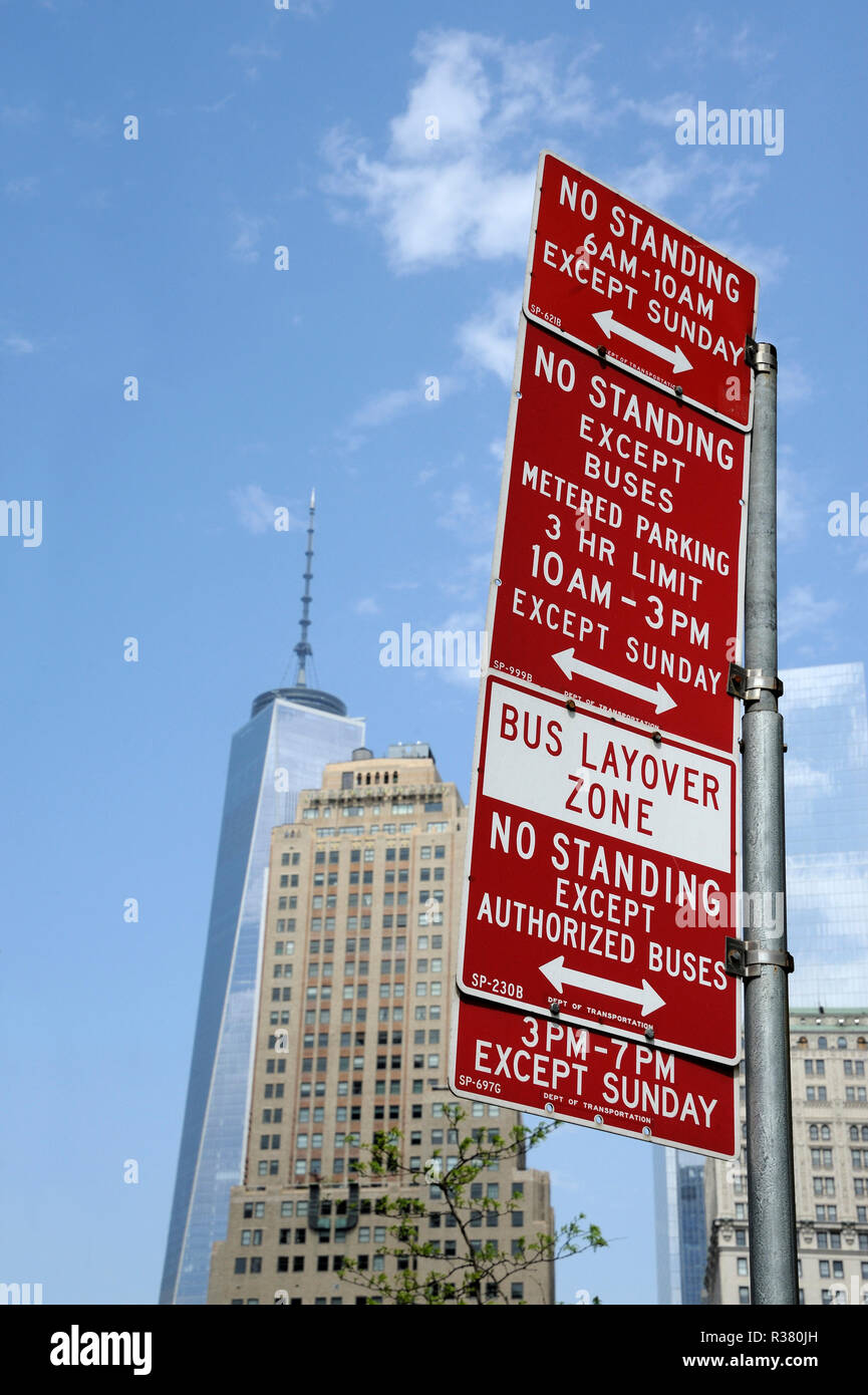 No standing signs in NewYork City with the World Trade Center at the