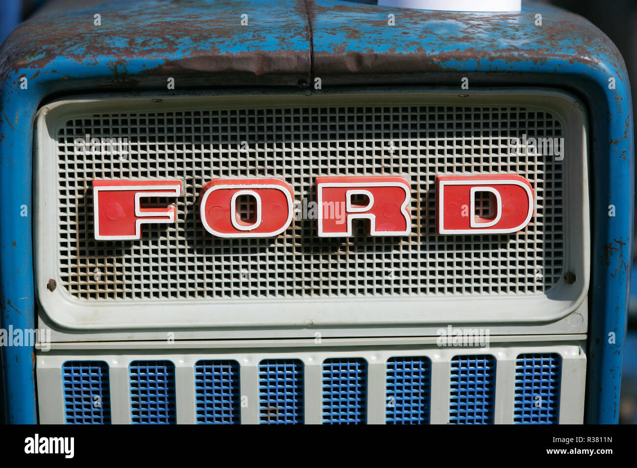 A vintage Ford tractor on display at a country fair. England UK GB Stock Photo