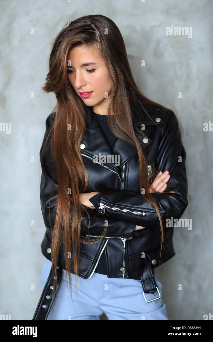 Fashion and vogue. Beautiful girl in leather jacket Stock Photo
