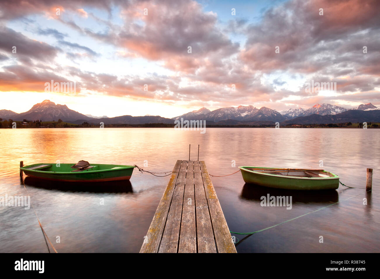 rowing boat on alpine lake Stock Photo - Alamy