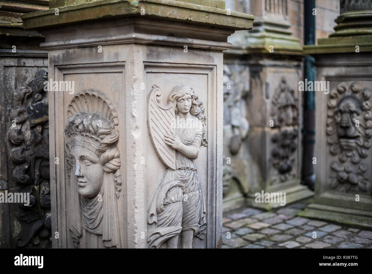 Kronborg Castle Friezes And Sculptures Helsingør Denmark // HELSINGØR, Denmark — Sculptures and friezes etched into the walls of Kronborg Castle depict themes of the dramatic arts and music. These Renaissance artworks celebrate the cultural and artistic legacy of the Danish royal court. Known as Hamlet’s Castle, Kronborg is a UNESCO World Heritage Site. Stock Photo