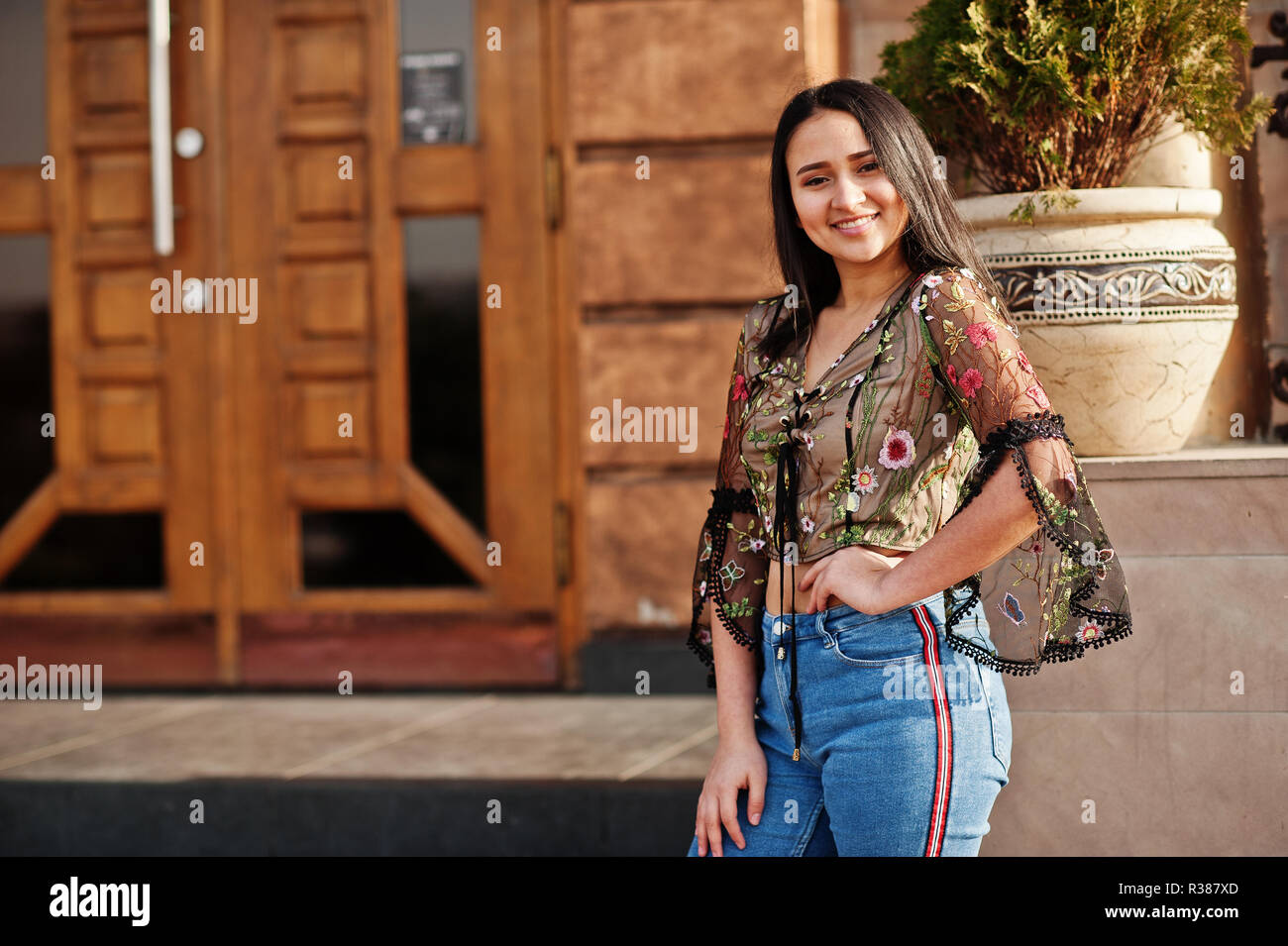 Pretty latino model girl from Ecuador wear on jeans posed at street Stock  Photo - Alamy