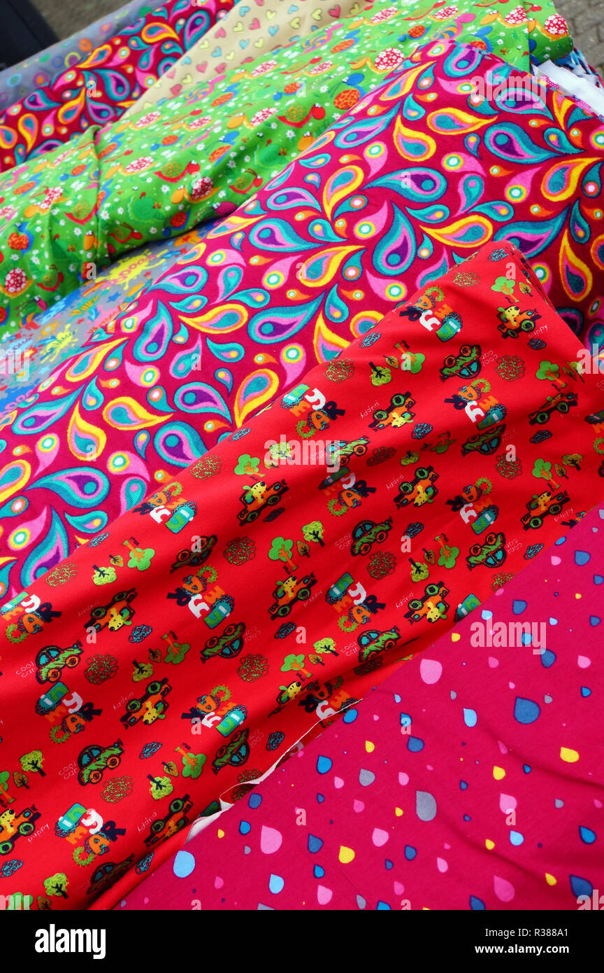 fabrics and haberdashery on the cloth market Stock Photo Alamy