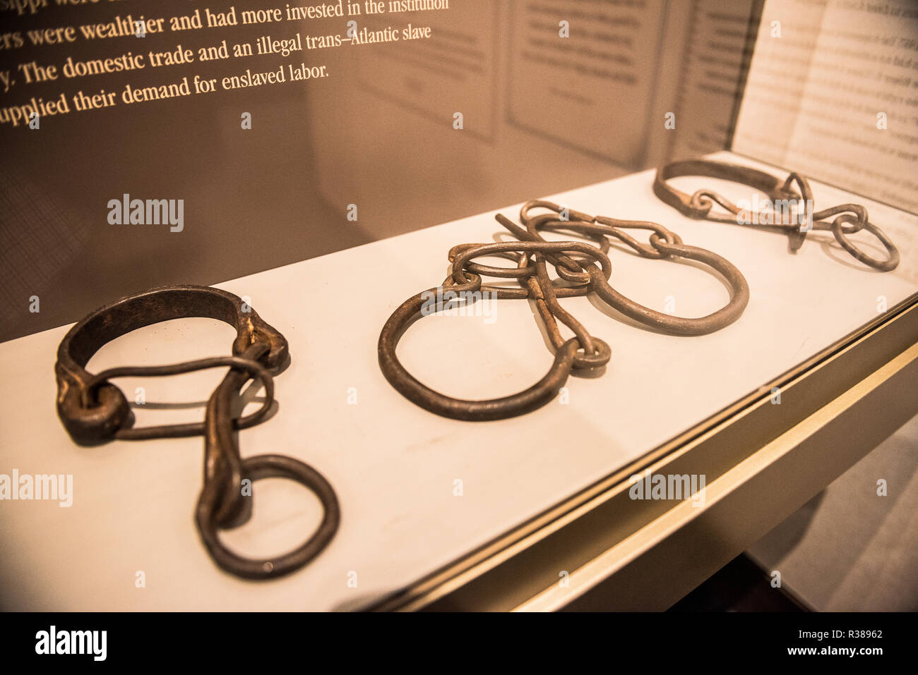 WASHINGTON, DC - Shackles in a display case at the African American Civil War Museum in Washington DC. The African American Civil War Museum preserves and tells the stories of the united States Colored Troops in the American Civil War. The museum is located in Northwest Washington DC, across the street from the African American Civil War Memorial, in the U Street neighborhood. Stock Photo