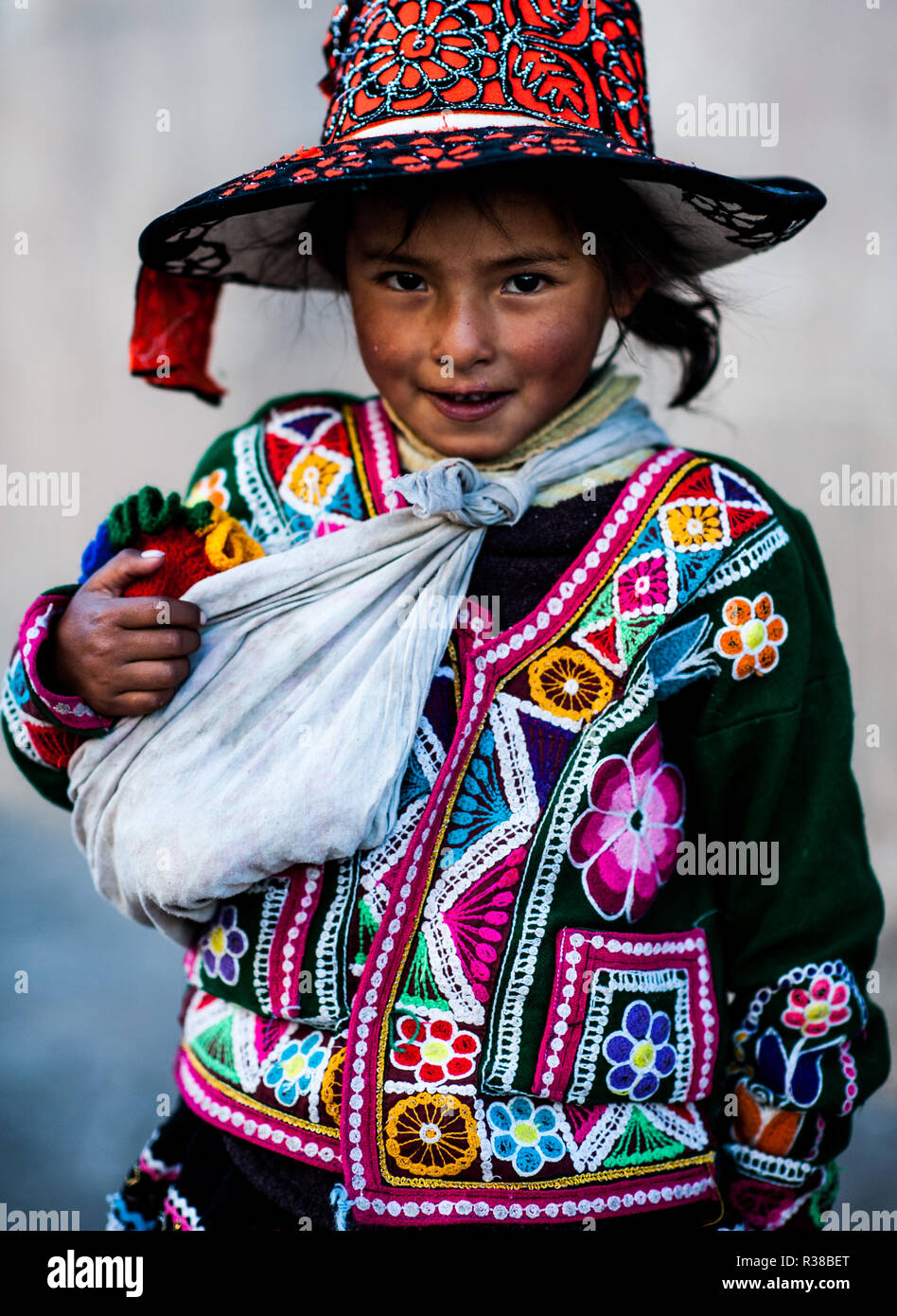 Peruvian Girl In Traditional Dress A Posing For A Photo In Cusco Peru South America Stock
