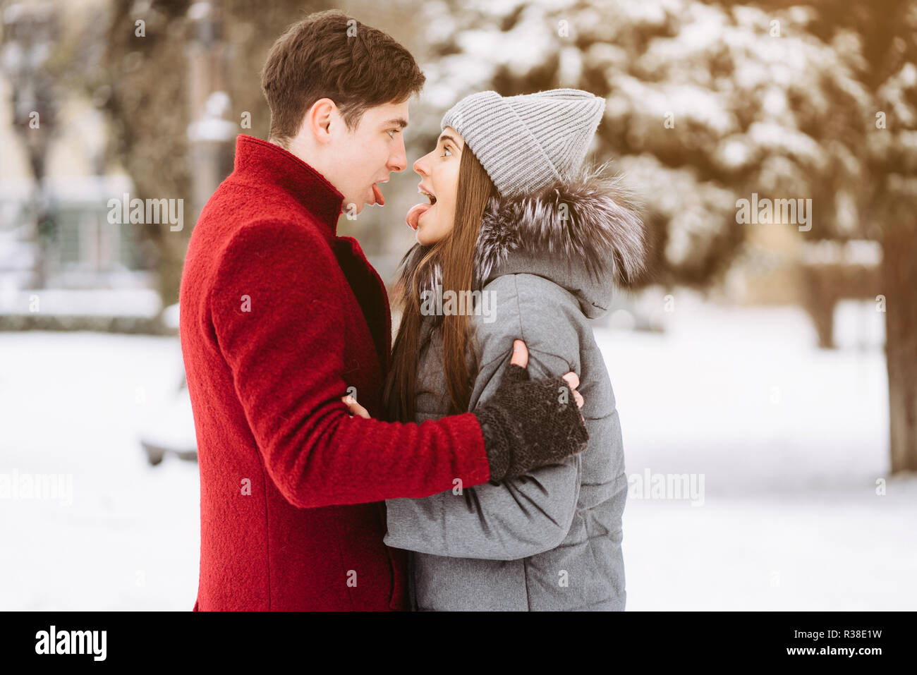 A young guy and a girl are hugging each other Stock Photo - Alamy