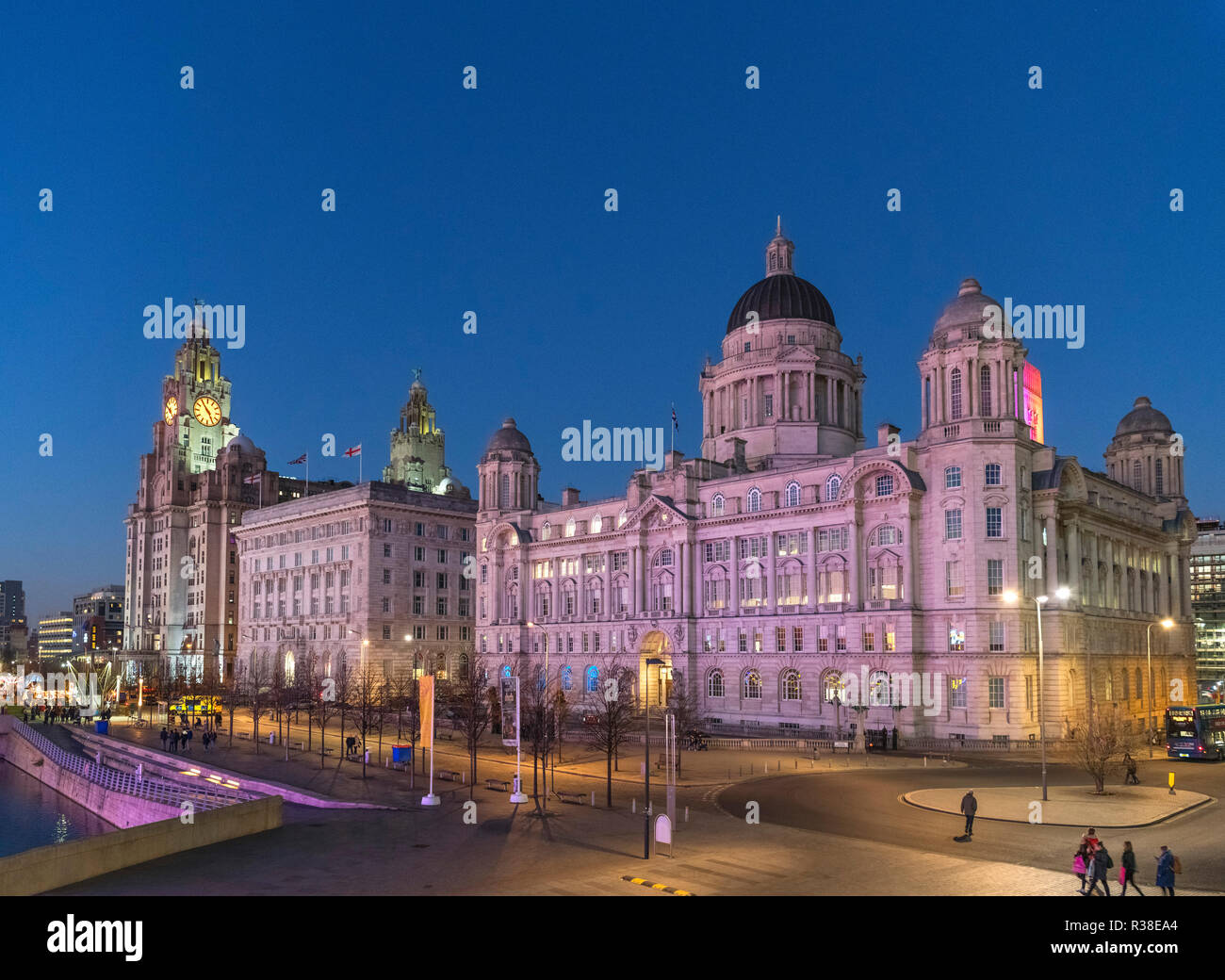 Three Graces at night, Pier Head, Liverpool, England, UK Stock Photo
