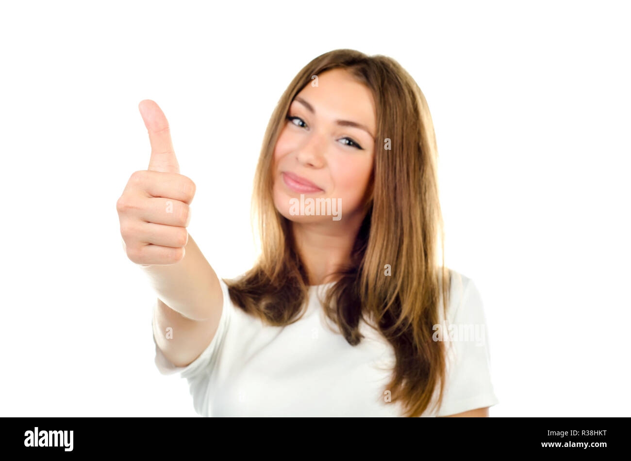 young girl showing thumb up isolated on a white background Stock Photo ...