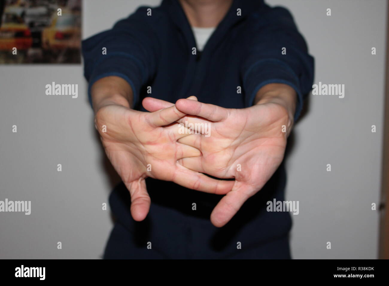 Cracking Knuckles, Female Stock Photo Alamy