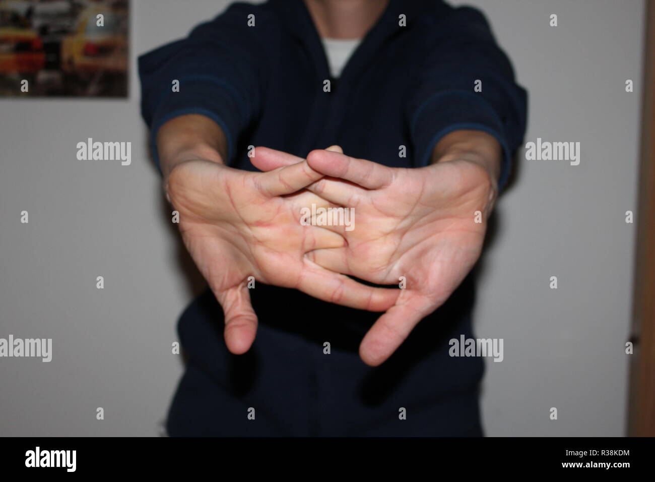 Cracking Knuckles, Female Stock Photo Alamy