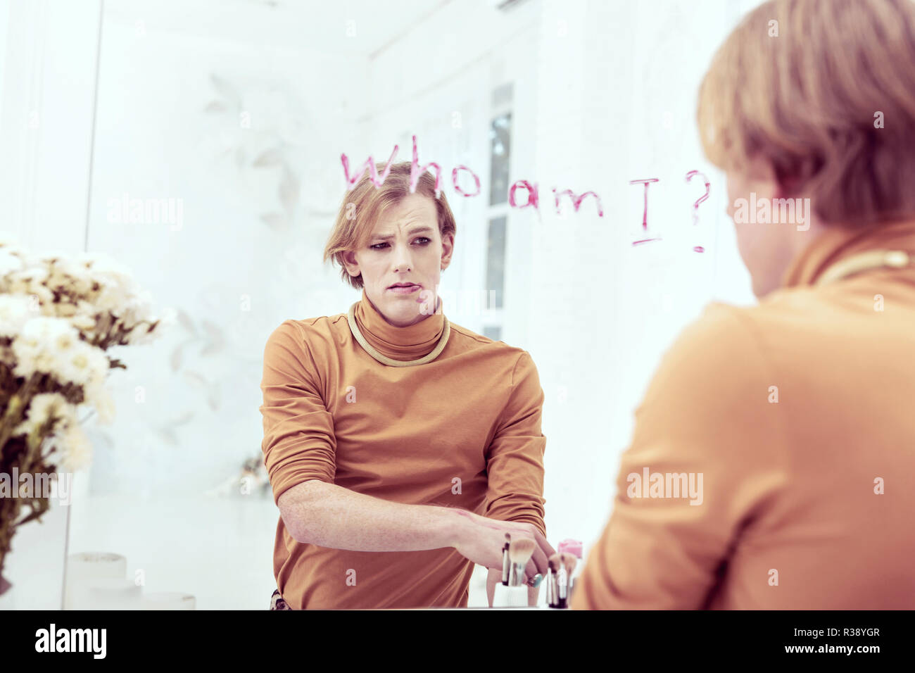 Frustrated abandoned transgender feeling bad about his identity Stock Photo