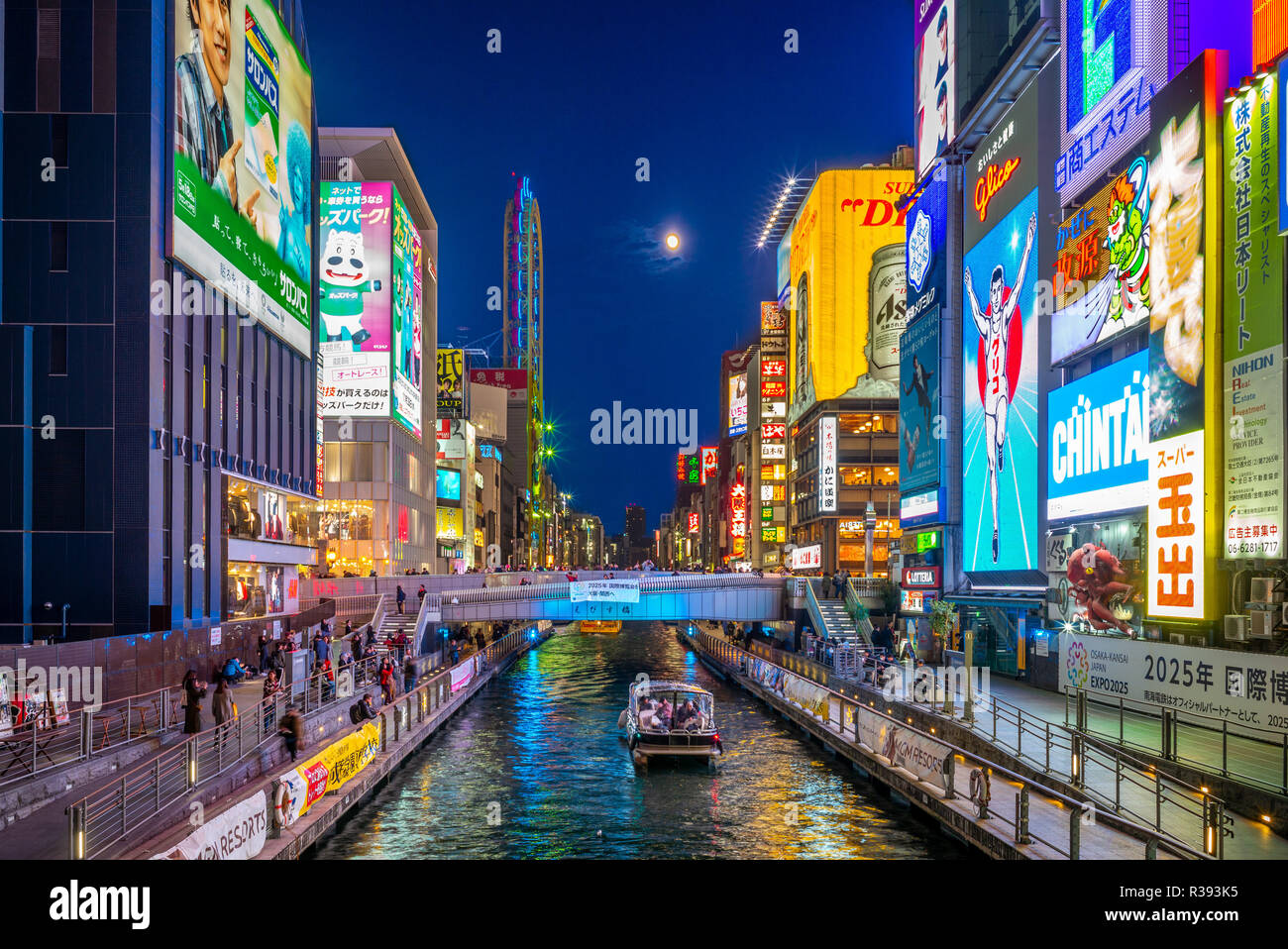 Osaka, Japan - November 21, 2018: night view of dotonbori, a principal tourist destinations in Osaka along the Dotonbori canal from Dotonboribashi Bri Stock Photo