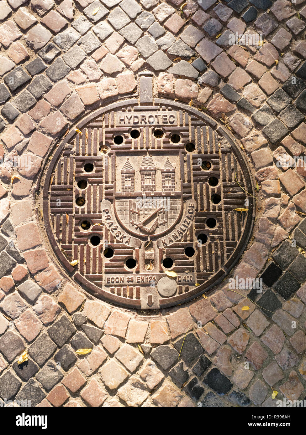 Traditional manhole cover for street hatchway in Prague Stock Photo