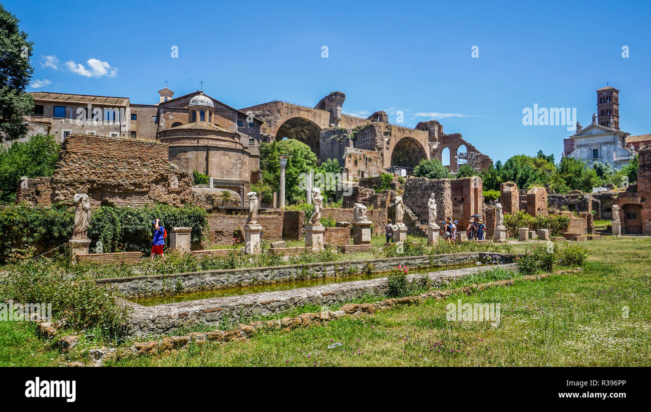 gallery of Roman statues along the remains the remains of the old atrium and palace of the House of the Vestals at the Roman Forum, Rome, Italy Stock Photo