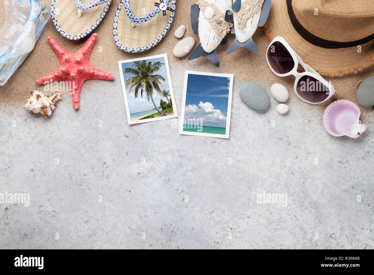Travel vacation concept with beach hat, sunglasses and weekend photos. Top view with copy space. Flat lay. All photos taken by me Stock Photo
