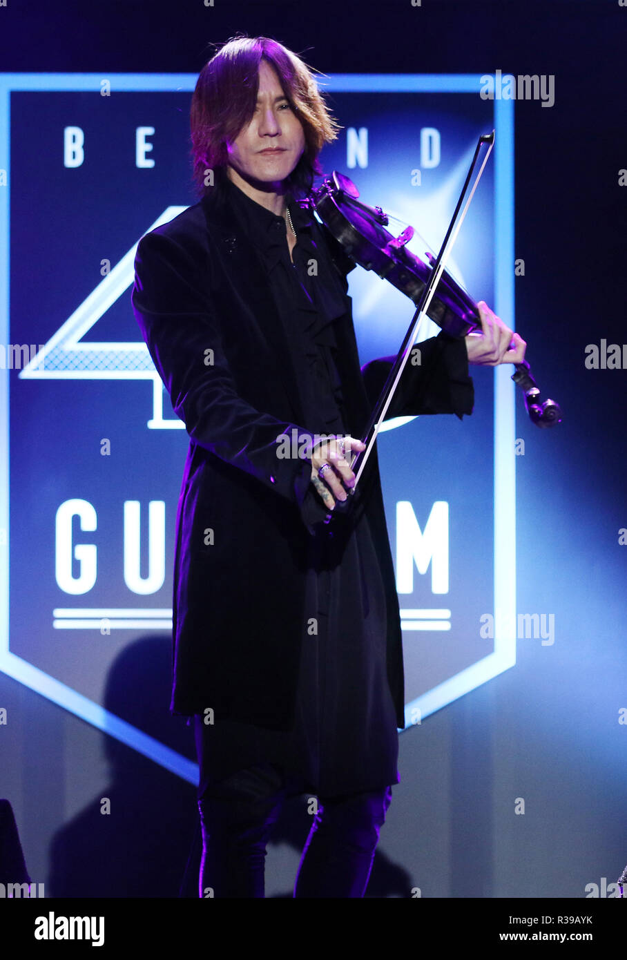 Tokyo, Japan. 21st Nov, 2018. Japanese rock band Luna Sea guitarist SUGIZO plays violin "The Beyond", a theme music for the 40th anniversary of "Mobile Suit GUNDAM", original animation started in 1979, in Tokyo on Wednesday, November 21, 2018. The 18-meter tall robot GUNDAM is expecting to walk in Yokohama in 2020, called "GUNDAM Global Challenge" as a part of the 40th anniversary project of Mobile Suit GUNDAM. Credit: Yoshio Tsunoda/AFLO/Alamy Live News Stock Photo