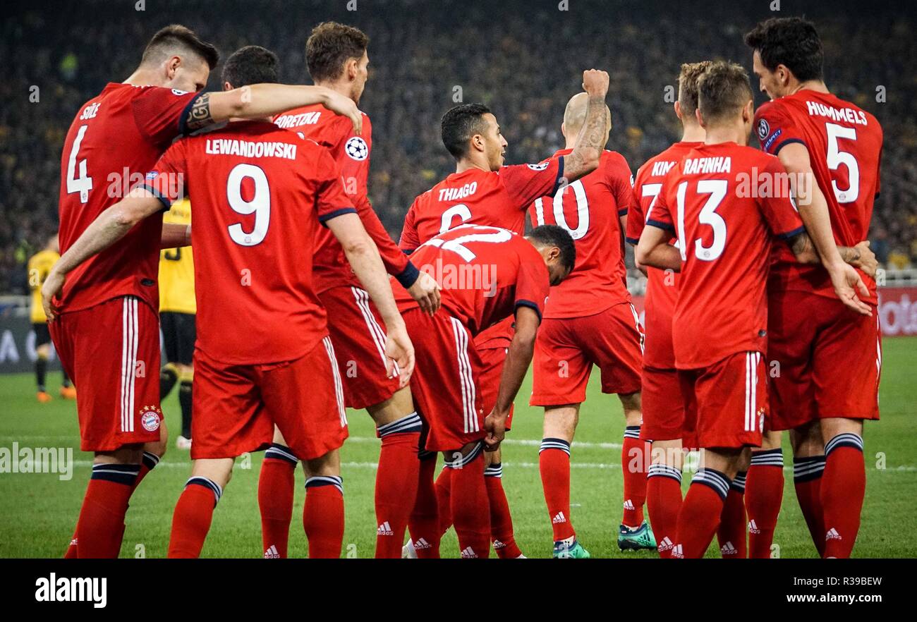 Bayern Munich team players are seen celebrating after scoring a goal during  the Group E match of the UEFA Champions League between AEK FC and Bayern  Munich FC at the Olympic Stadium