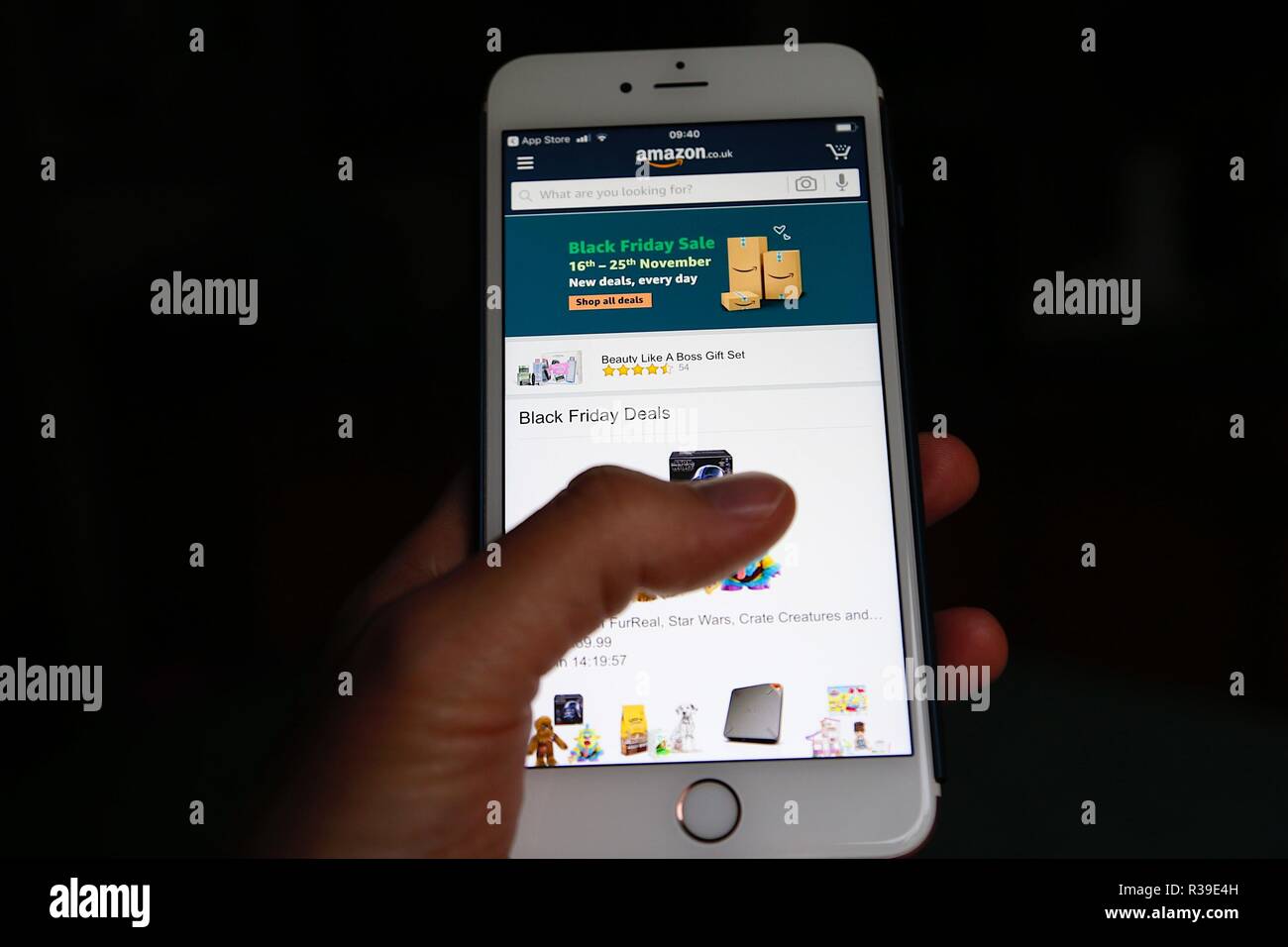 Ashford, Kent, UK. 22nd Nov, 2018. Black Friday sales approaches as this persons finger hovers over an amazon special offer on an iPhone mobile phone. © Paul Lawrenson 2018, Photo Credit: Paul Lawrenson / Alamy Live News Stock Photo
