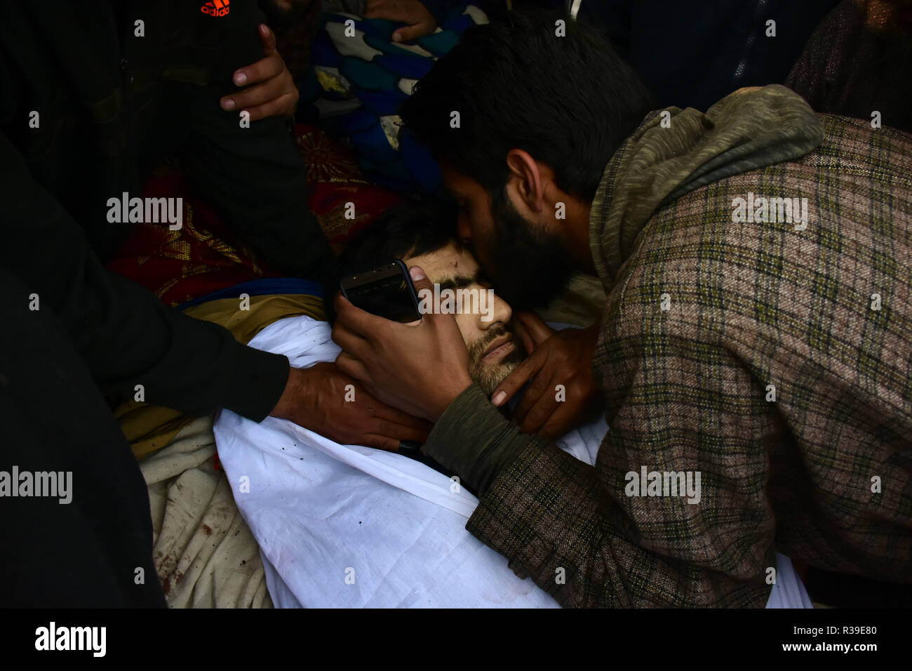 November 20, 2018 - Kashmiri Muslims attend the funeral of rebel Abid Chopan who was killed during a confrontation with Indian forces in the Shopian district of Indian administered Kashmir on 20 November 2018. Chopan is one of four rebels killed in a gunfight between Indian forces and Kashmiri rebels who were identified as Inam ul Haq of Feripora, Abid Nazir Chopan of Paddarpora, Mehraj ud Din Najar of Drawni Zainapora and Basharat Ahmad of Chotigam. Two Indian paratroopers were also killed in the exchange of fire. A lady was also injured by a live ammunition near the gunfight site in the Shop Stock Photo