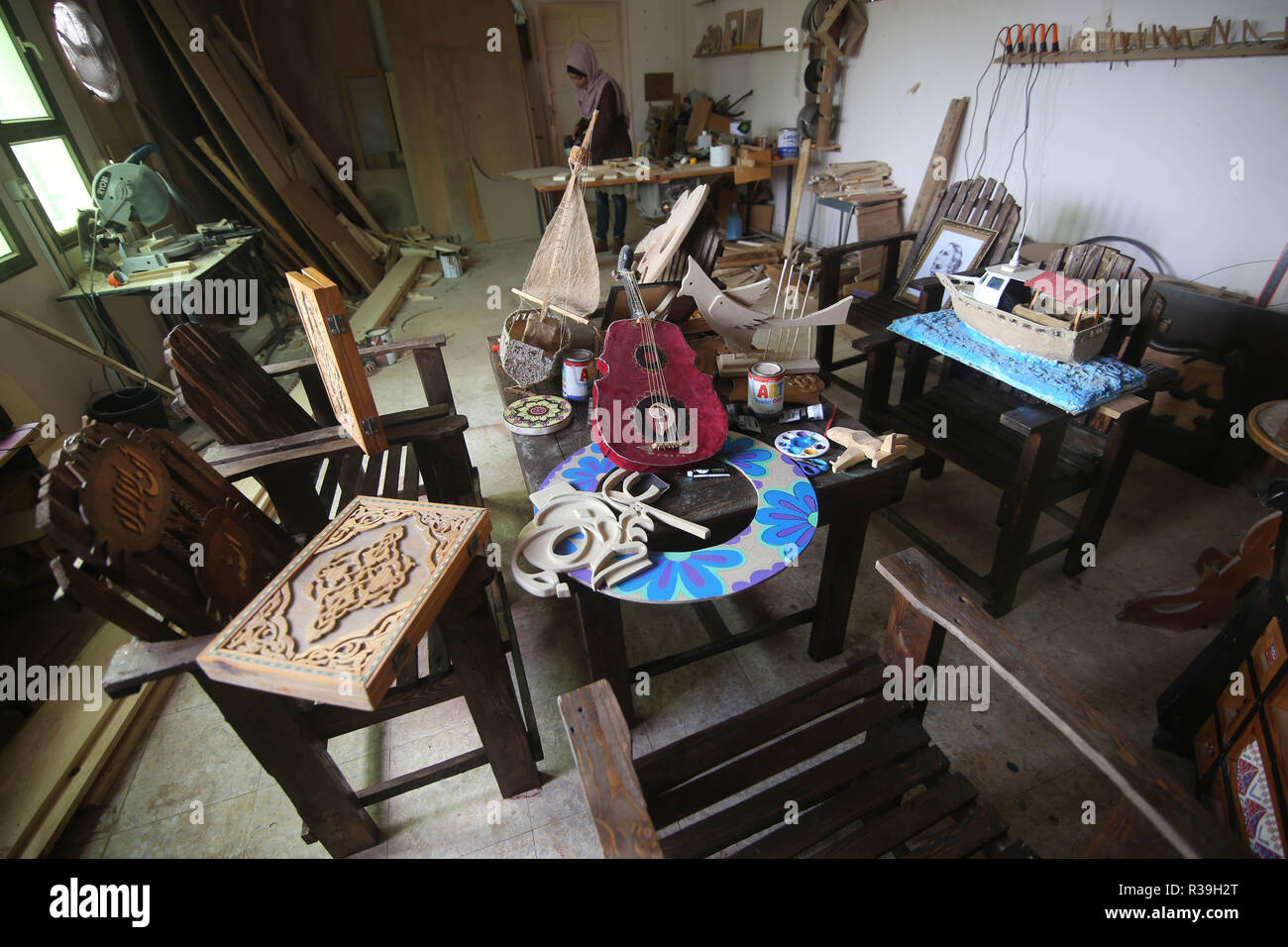 Gaza. 22nd Nov, 2018. Art pieces made of wood are seen inside Palestinian artist Walaa Abu al-Aish's workshop in the southern Gaza Strip city of Rafah, on Nov. 22, 2018. The 22-year-old Walaa makes a living by creating art pieces out of wood and selling them through social media on Internet. Credit: Khaled Omar/Xinhua/Alamy Live News Stock Photo