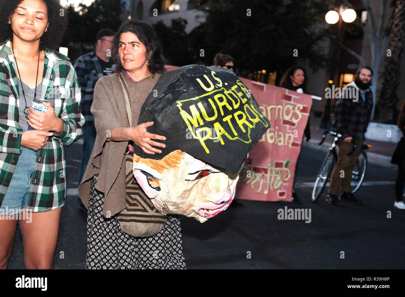 Tucson, Arizona, USA. 21st Nov, 2018. Protesters turn out onto the street of Tucson after the not guilty verdict in the 2012 shooting of Mexican teen Jose Antonio Elena Rodriguez. Border Patrol agent Lonnie Swartz shot the teen 16 times through the border fence in Nogales after the boy was allegedly throwing rocks at agents. Instead of retreating for cover like other agents Swartz chose to use deadly force and kill the fleeing Rodriguez . This was the the second trial of Swartz and the aquittal on involuntary manslaughter charges followed a not guilty verdict on federal charges last year Stock Photo