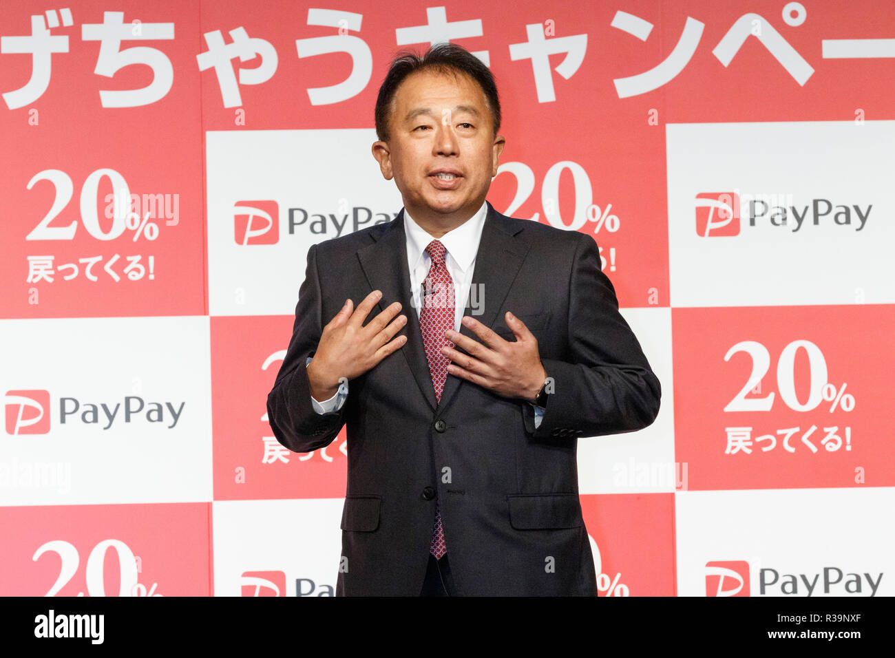 Jun Shimba representative director and COO of SoftBank Corp. speaks during a news conference to announce the new smartphone payment service ''PayPay'' on November 22, 2018, Tokyo, Japan. PayPay is a smartphone payment service using barcodes (QR codes) supported by SoftBank, Yahoo Japan and Paytm, that can be used in Japanese stores including Bic Camera, Yamada Denki and Family Mart. Credit: Rodrigo Reyes Marin/AFLO/Alamy Live News Stock Photo