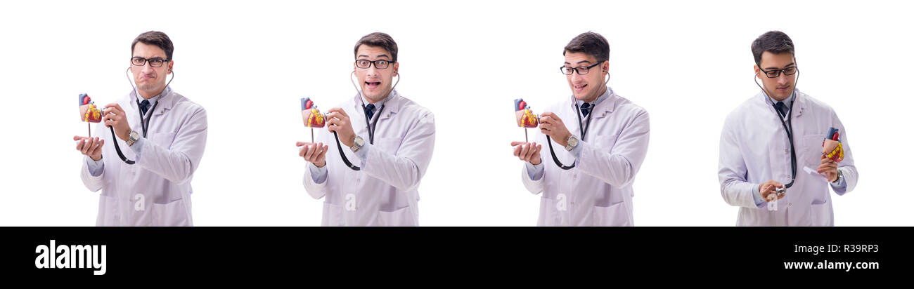 Young doctor with heart shape isolated on white Stock Photo - Alamy