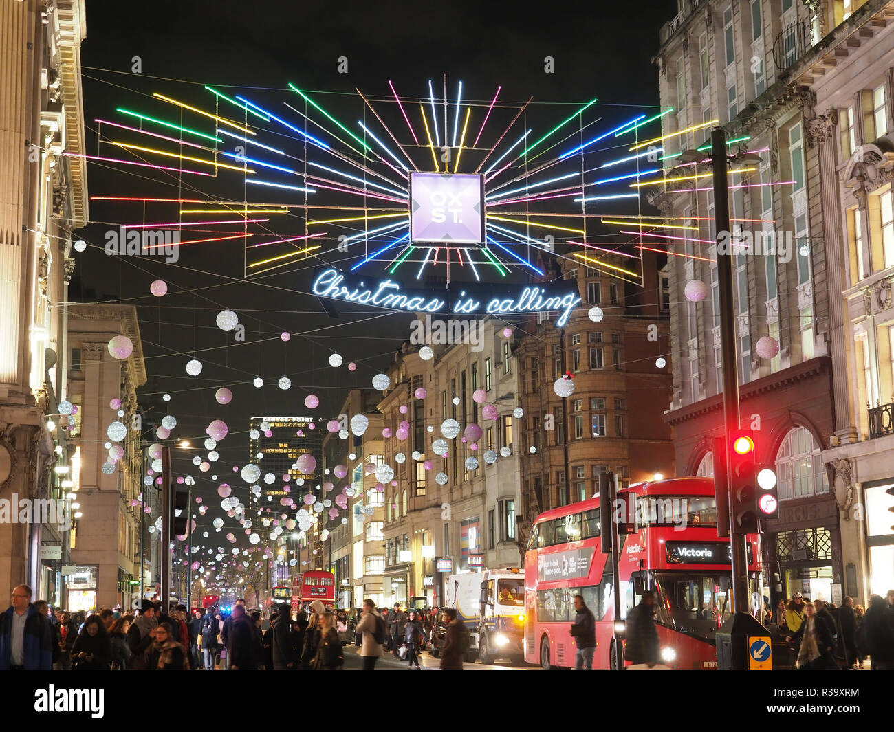 View looking up at the festive Christmas lights at night  in Oxford Street London 2018 Stock Photo