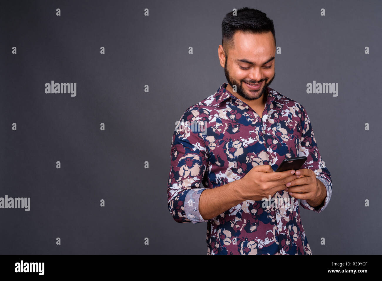 Indian bearded man using mobile hi-res stock photography and images - Alamy