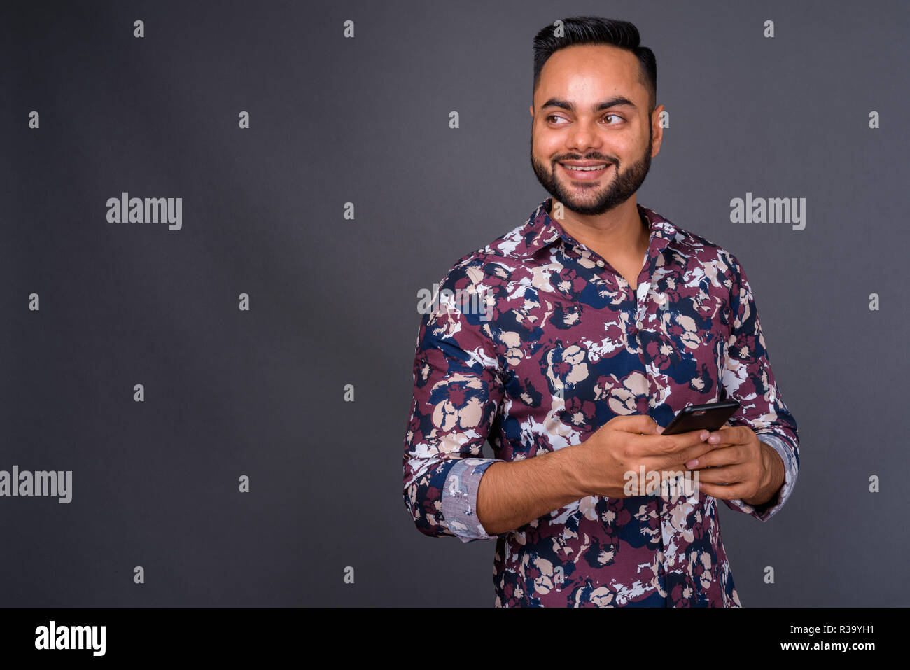 Indian bearded man using mobile hi-res stock photography and images - Alamy