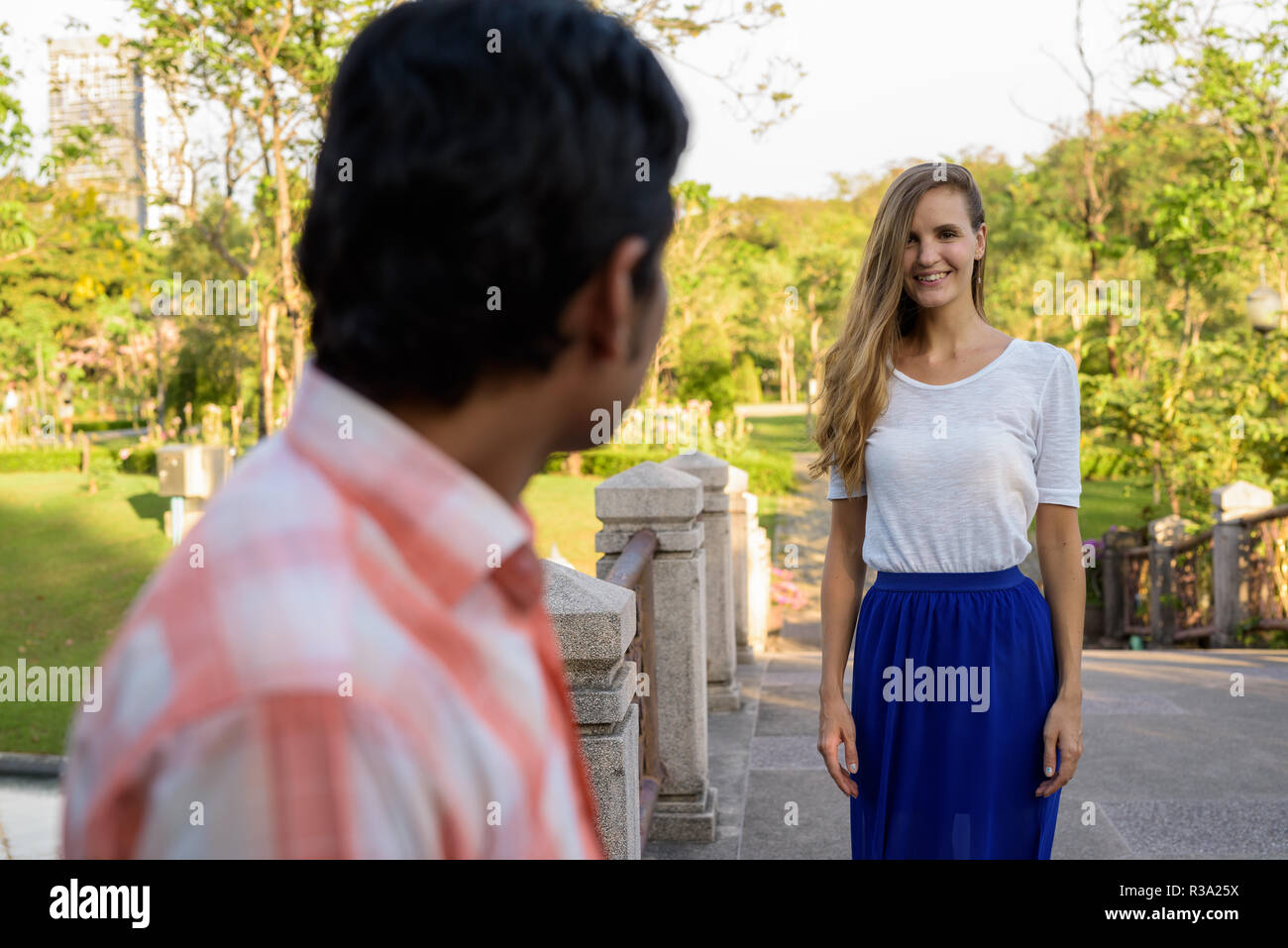 Happy lovers standing together hi-res stock photography and images - Alamy