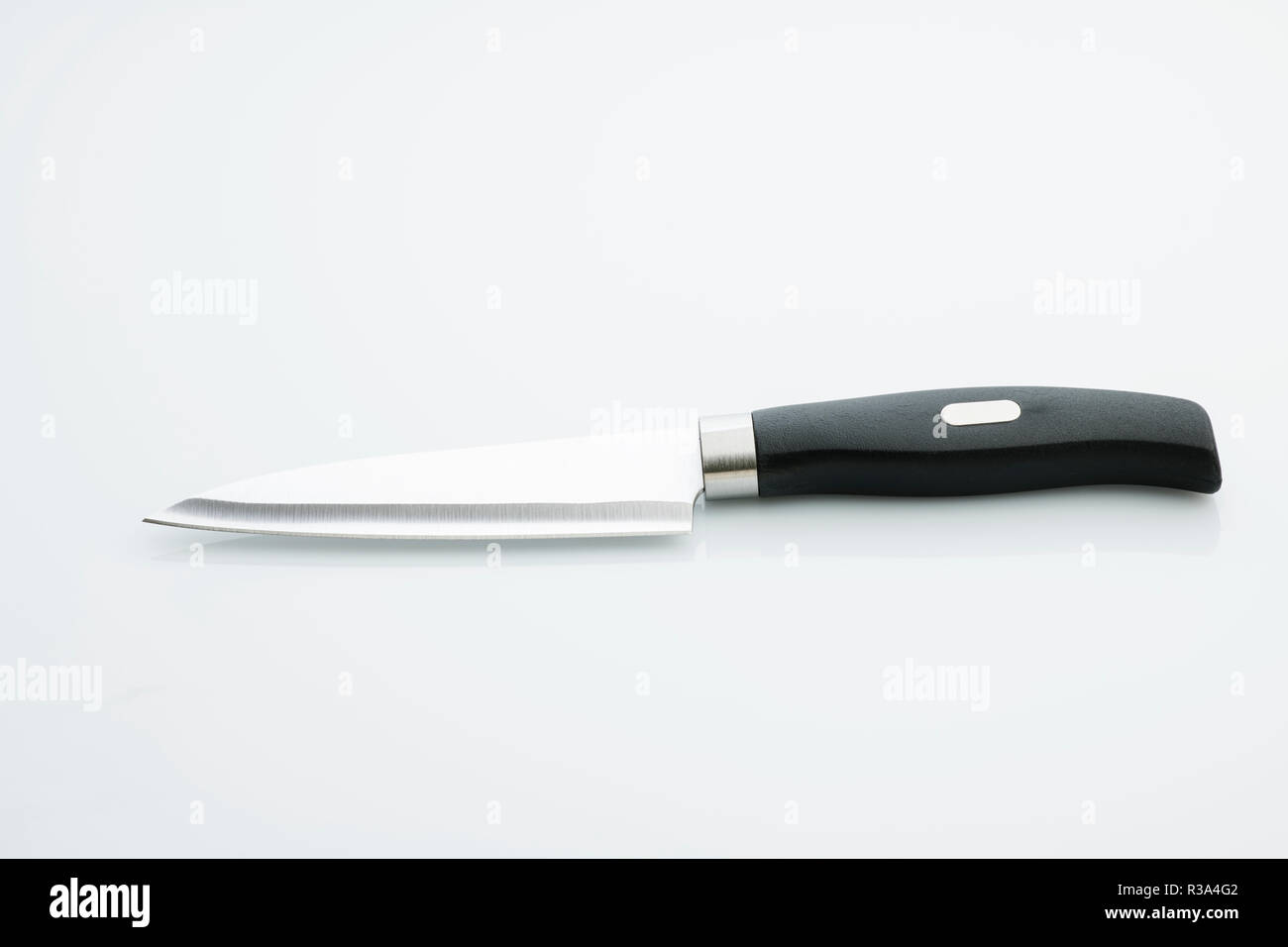 Kitchen: Top View of Kitchen Knife with Stainless Steel Blade on White Background Stock Photo