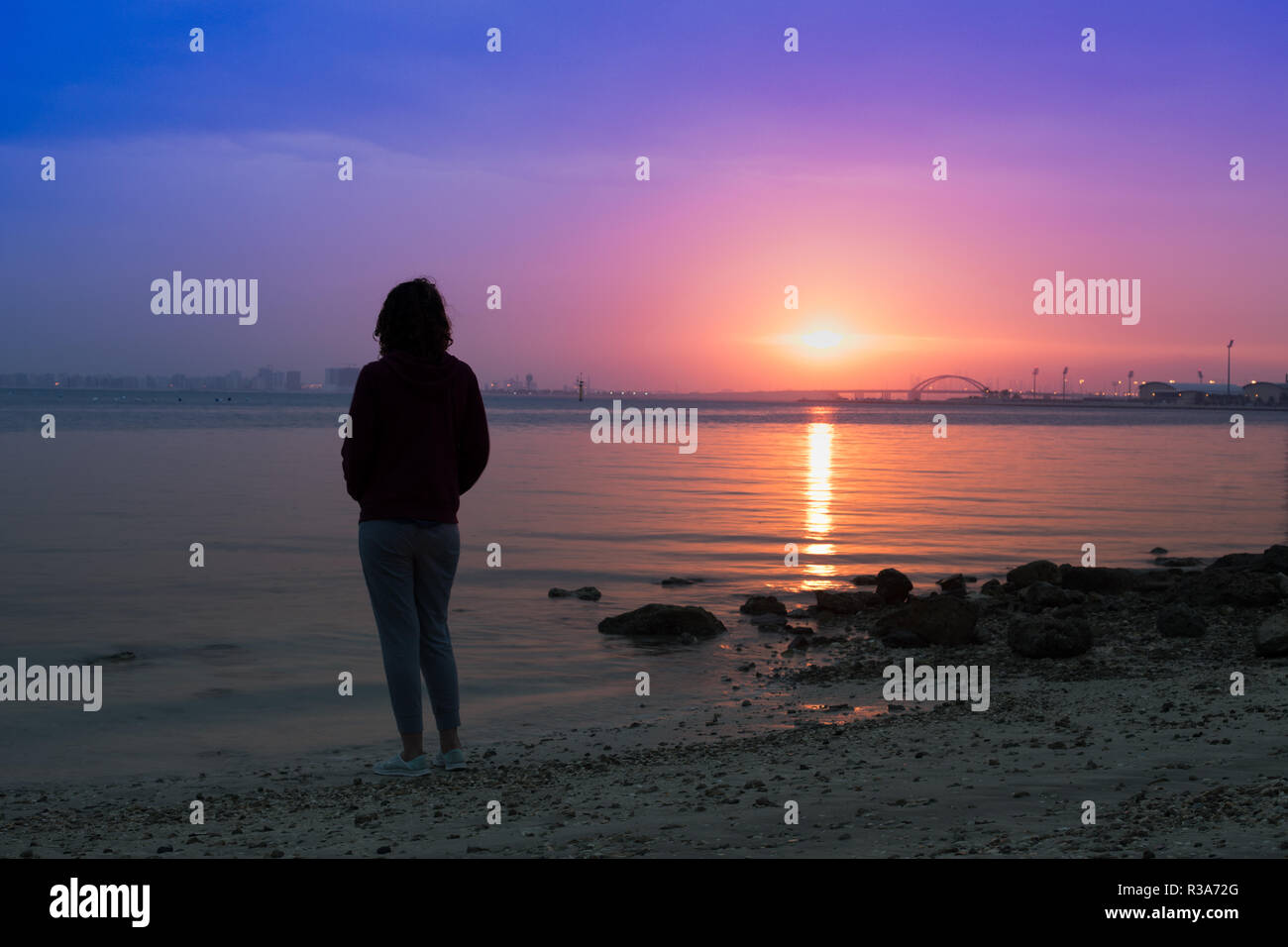Standing watching sun rise hi-res stock photography and images - Alamy