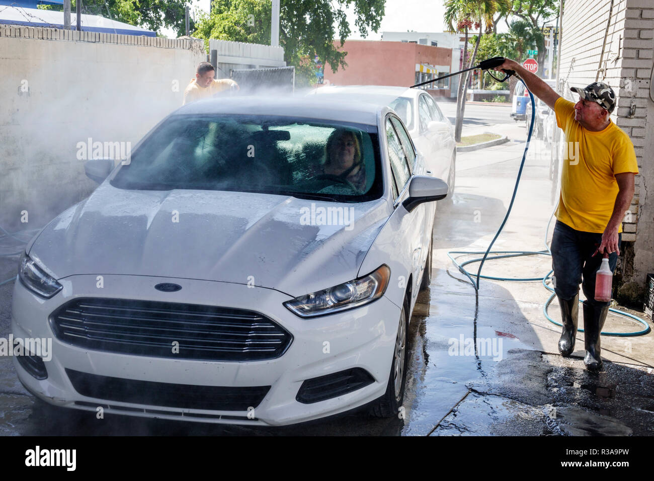 Miami Florida,Little Havana,car cars wash,white Ford Fusion,Hispanic