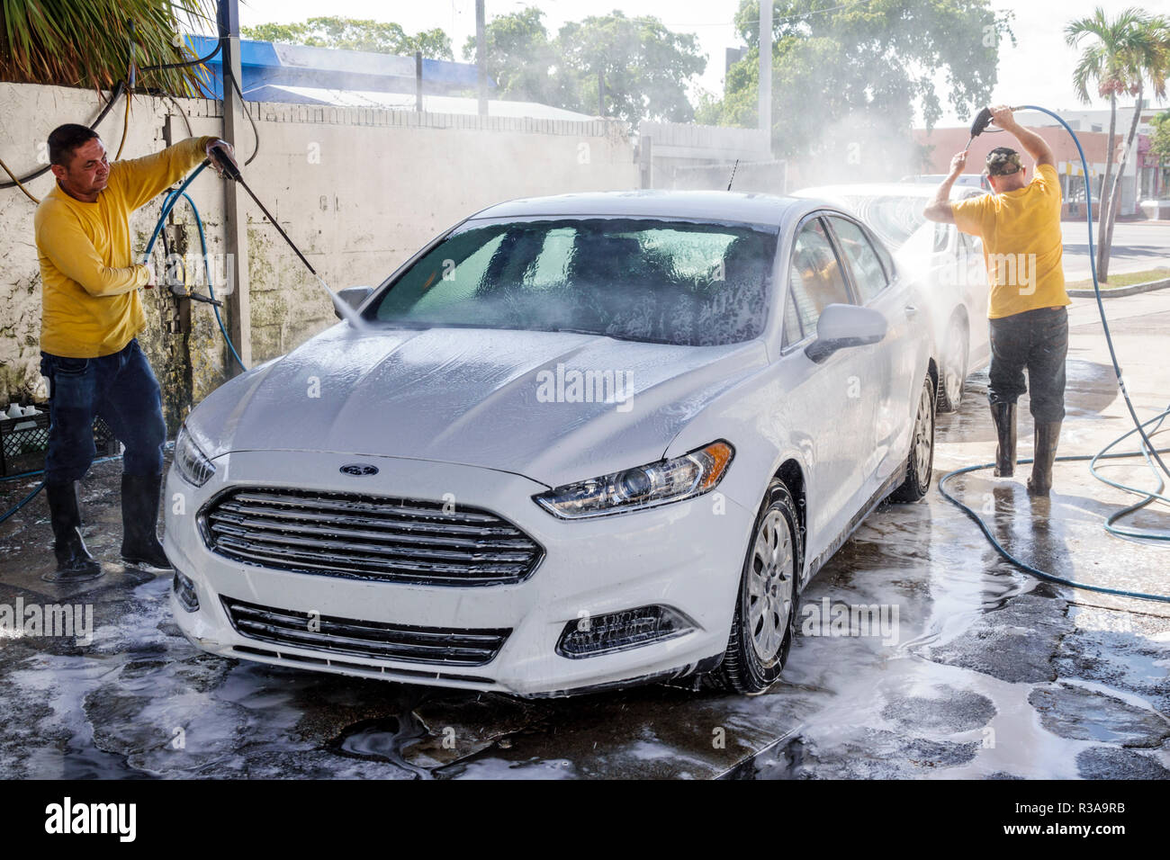 Miami Florida,Little Havana,car cars wash,white Ford Fusion,Hispanic