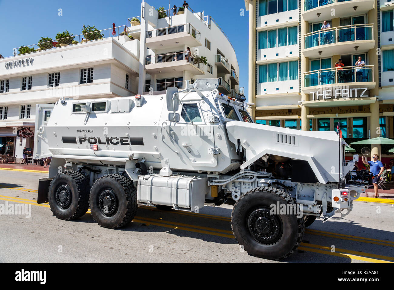 Miami Beach Florida,Ocean Drive,Veterans Day Parade activities,Police,military-grade,tank-like armored Mine-Resistant Ambush-Protected MRAP truck,FL18 Stock Photo