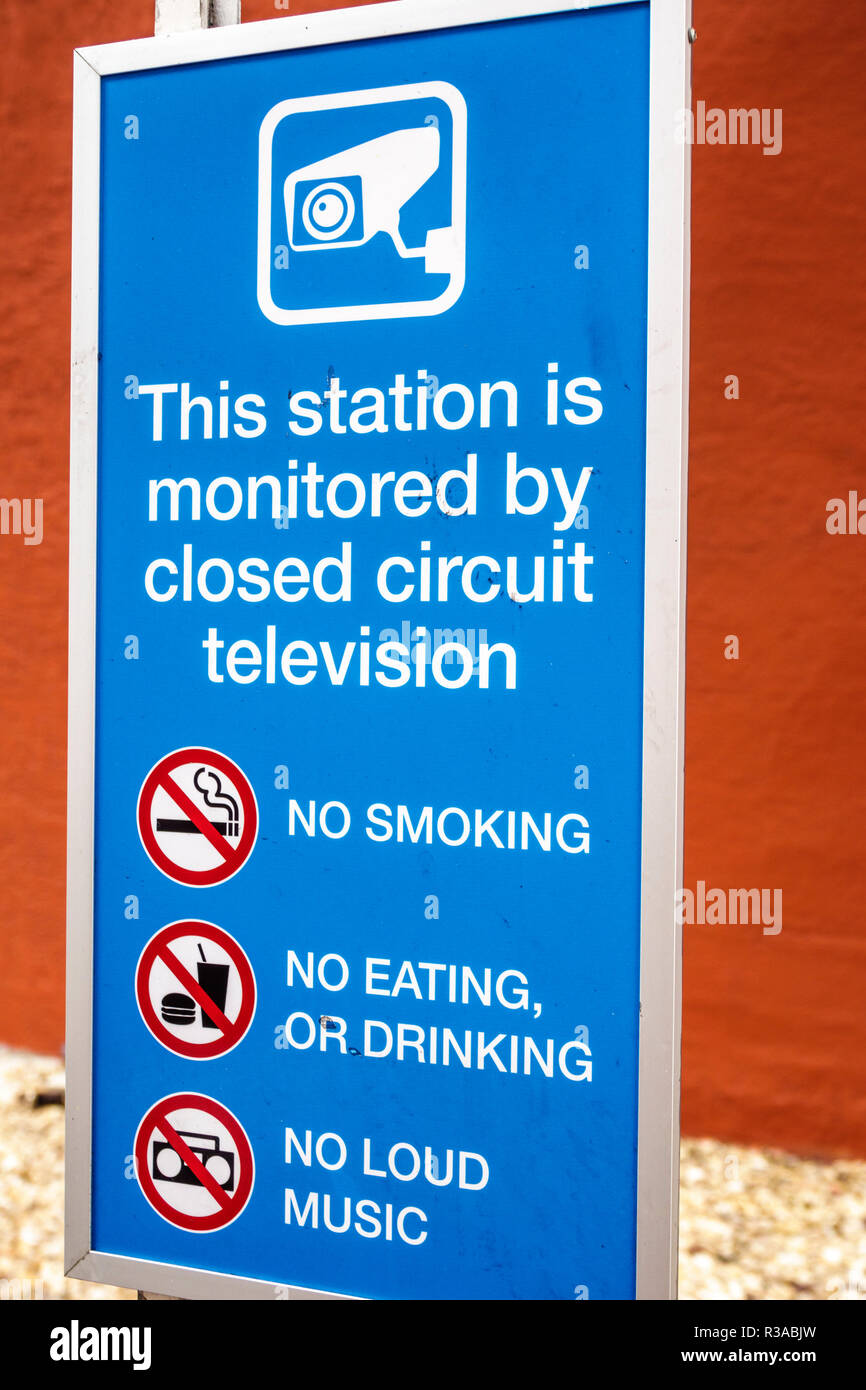 Miami Florida,sign,Metromover station monitored by closed circuit television,no smoking drinking eating loud music rules,FL181115119 Stock Photo