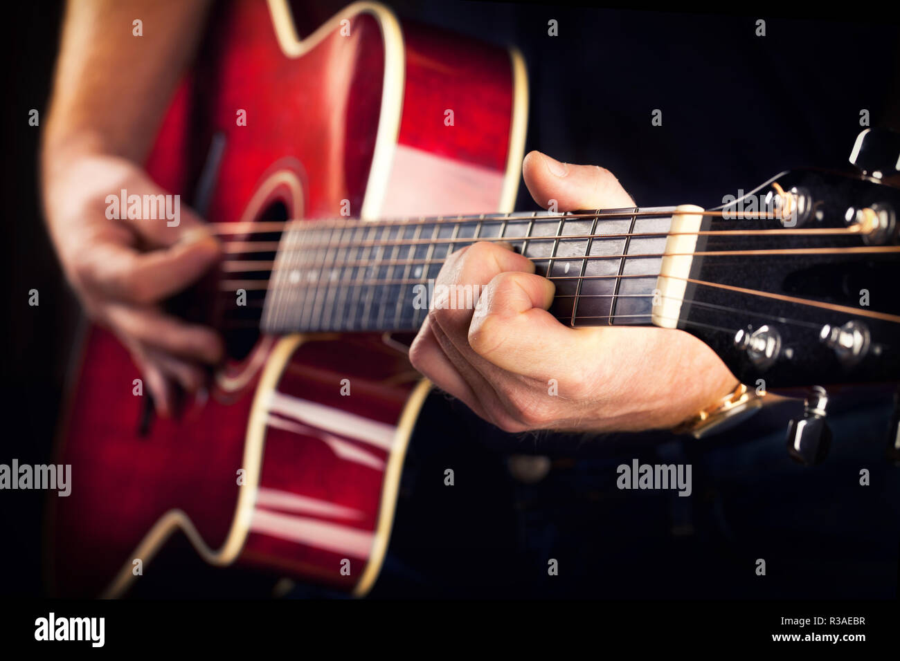 musician playing guitar Stock Photo