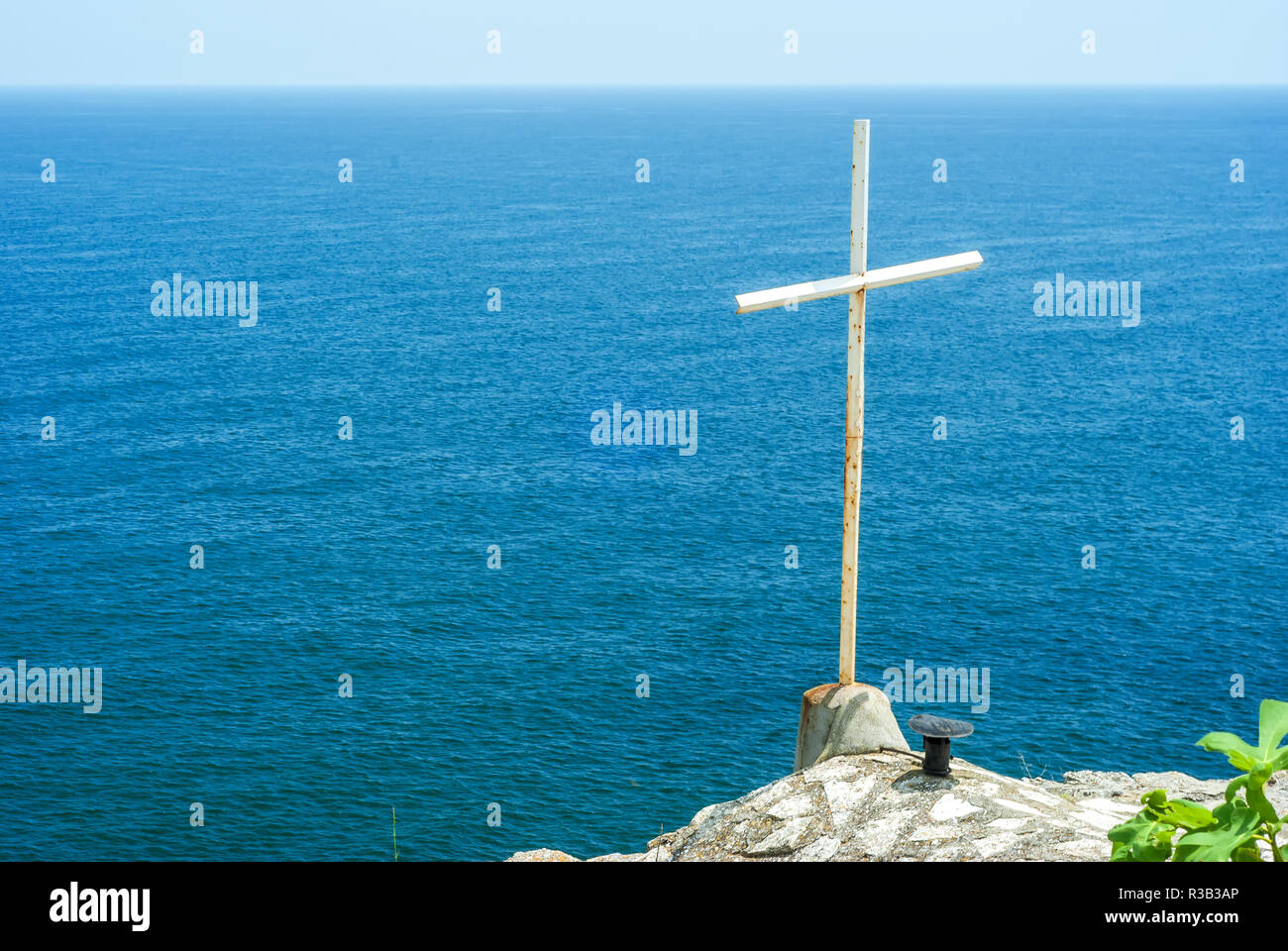 Christian cross and blue sea at Cape Kaliakra, Bulgaria Stock Photo