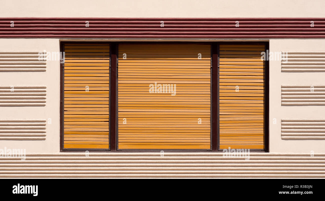Closed window with brown wooden shutters, background Stock Photo - Alamy