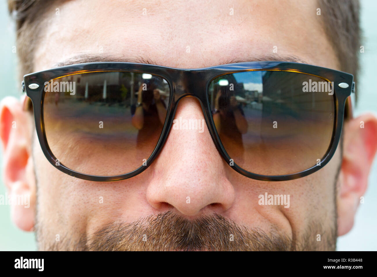 young,modern man in the sun Stock Photo