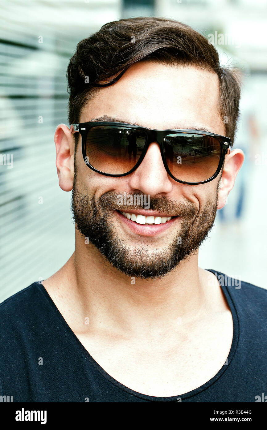 young attractive man wearing sunglasses Stock Photo