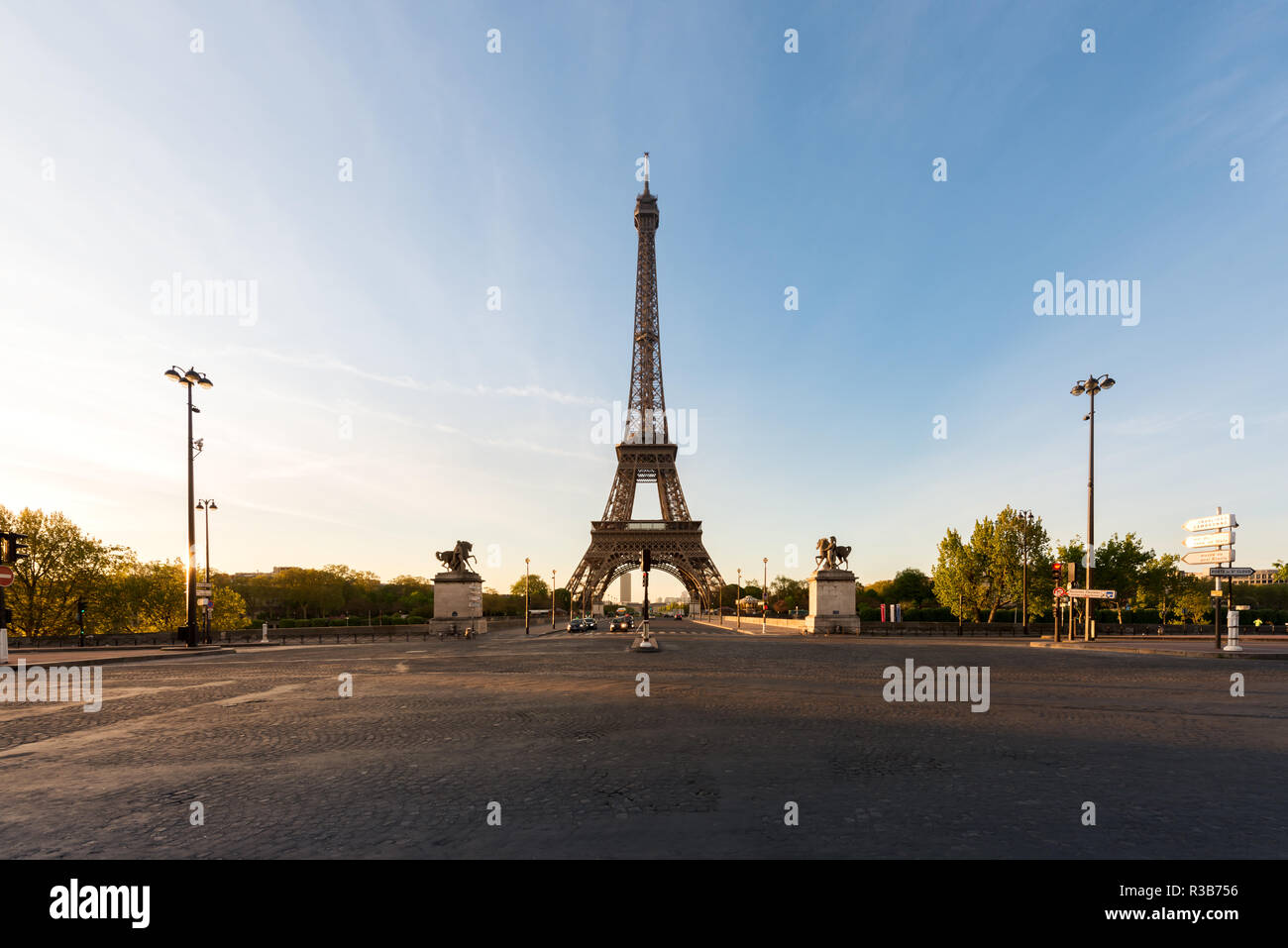 Eiffel Tower and river Seine at sunrise in Paris, France. Eiffel Tower is one of the most iconic landmarks of Paris. Stock Photo