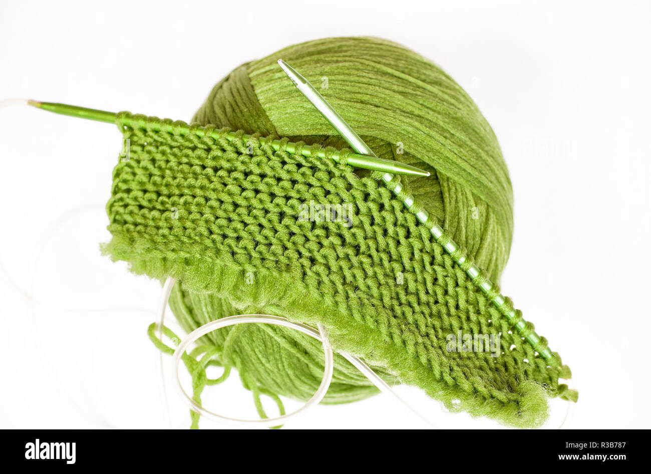 Knitting material with knitting needles on white background Stock Photo