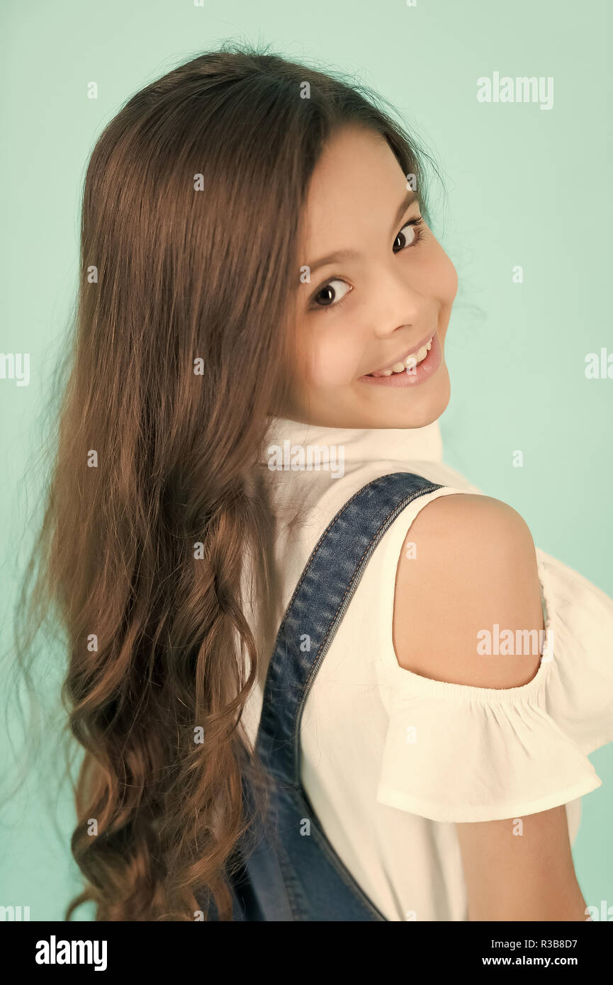 Kid Model With Long Healthy Brunette Hair Girl With Smile