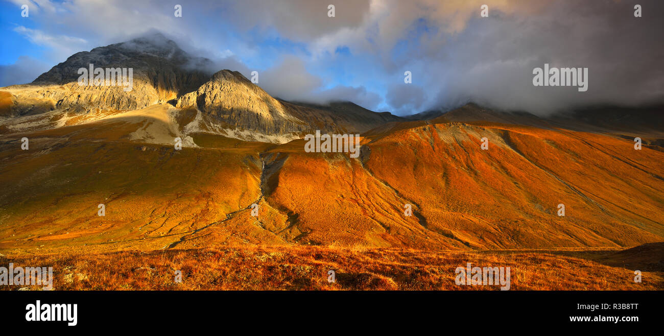 Panorama, Mountain landscape, morning light, dramatic clouds, Albula Pass, Canton Graubünden, Switzerland Stock Photo