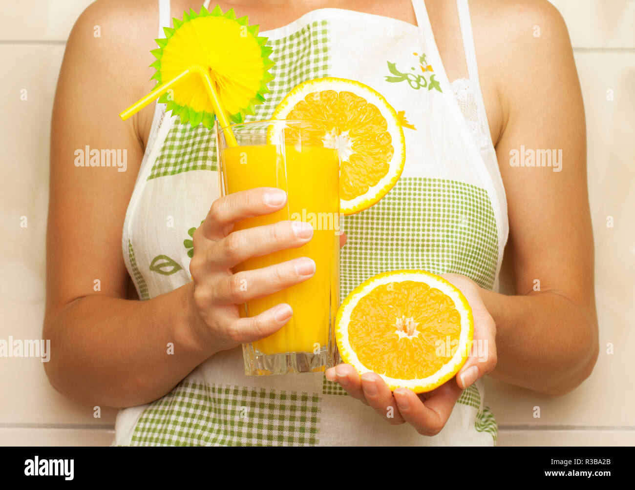 A Glass Of Fresh Orange Juice With A Straw Hi Res Stock Photography And