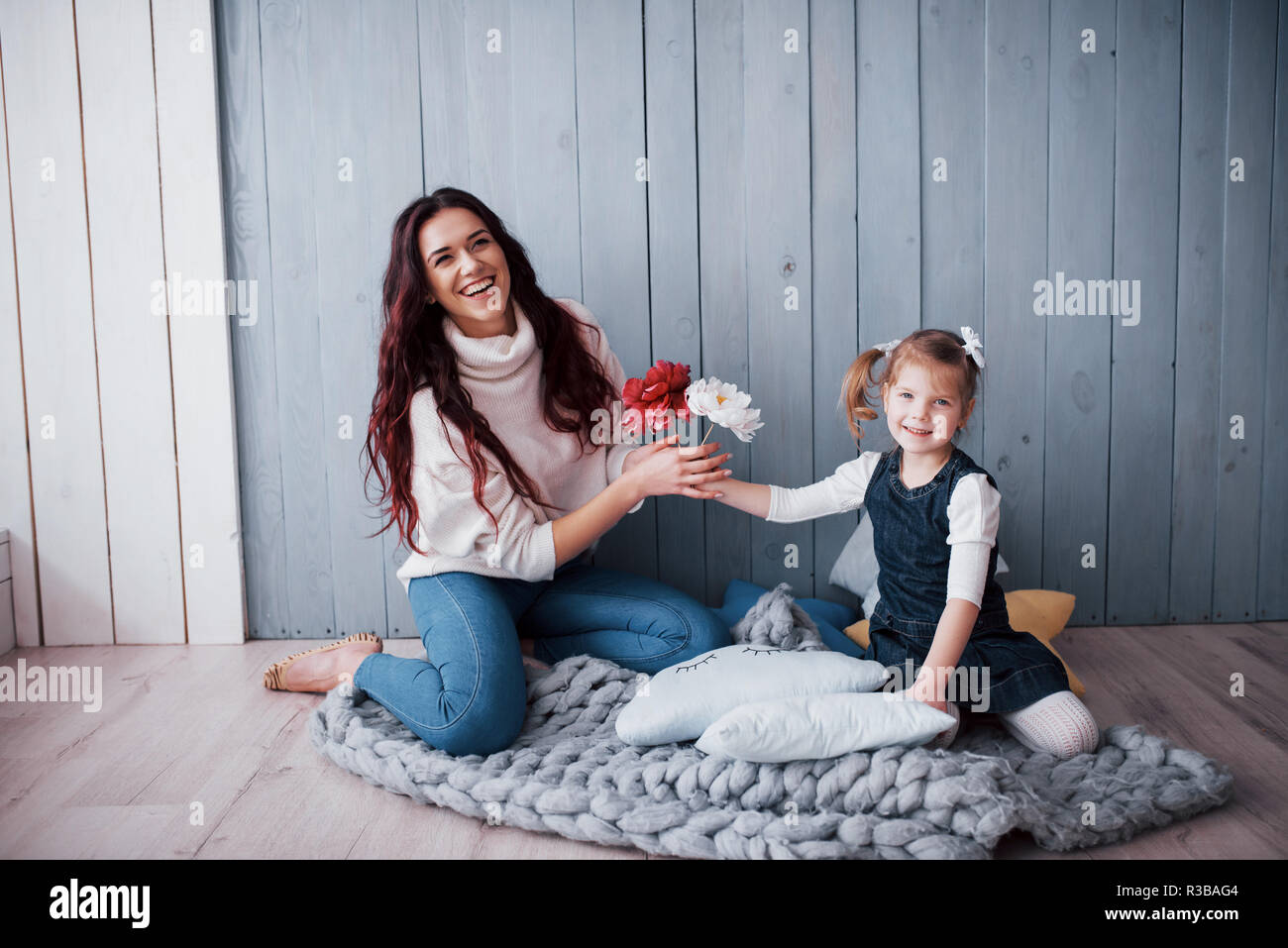 Happy loving family. Mother and her daughter child girl playing together Stock Photo