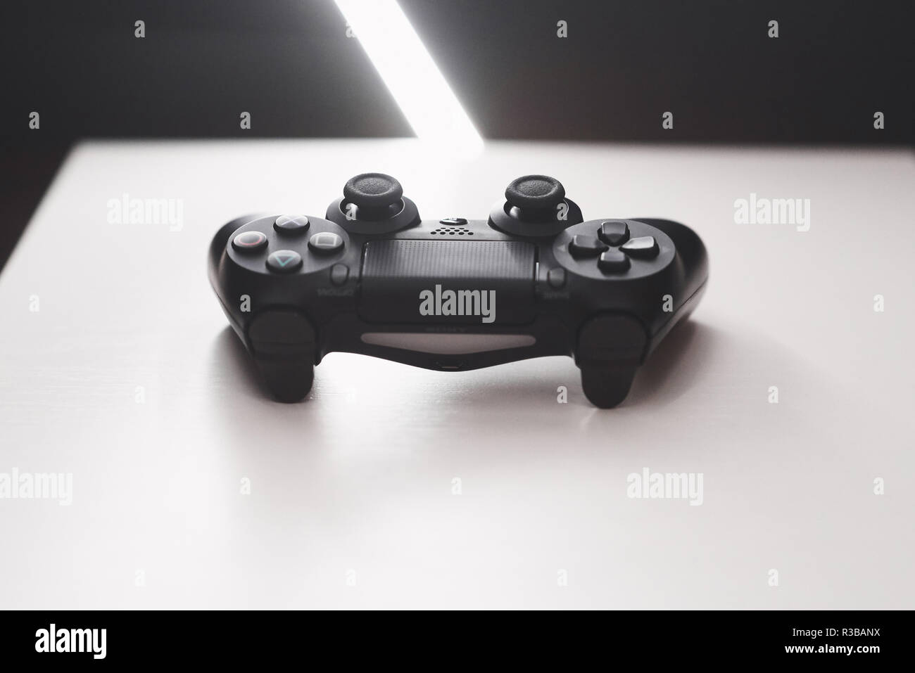 Joystick from the game console on a white table Stock Photo